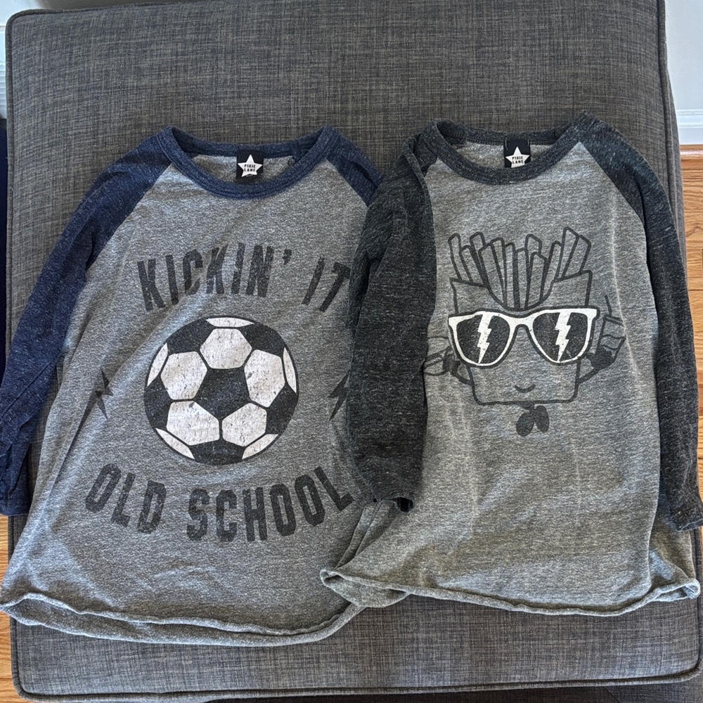 Two Pixie Lane Henley Raglan Graphic Tee - one heather gray and one navy